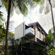 This private master ensuite addition was built onto architecture, arecales, building, cottage, home, house, palm tree, plant, property, real estate, tree, white, brown