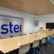 Sliding doors open up meeting rooms to an ceiling, classroom, conference hall, interior design, office, table, gray