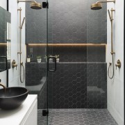 Black meets white with touches of warm brass bathroom, floor, flooring, plumbing fixture, room, shower, tile, wall, gray, black, white