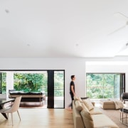 In this whole-house renovation by architect Melonie Bayl-Smith, ceiling, daylighting, home, house, interior design, living room, property, real estate, window, white