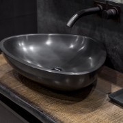 Engineered stone benchtop vessels add to other curved cookware and bakeware, plumbing fixture, sink, black