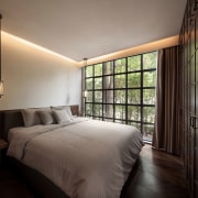 Architect Phongphat Ueasangkhomset of Anonym Studio repurposed this architecture, bedroom, home, interior design, suite, wall, window, wood, Phongphat, Anonyum Studio, entranceway, joinery