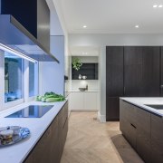 Detailing was important to assimilating this new kitchen architecture, countertop, interior design, kitchen, real estate, room, gray, teal