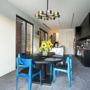 This new dining and kitchen area is on chair, dining room, furniture, home, house, interior design, room, table, gray