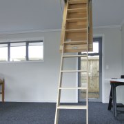 Dedicated storage is a feature of this Fowler ladder, gray