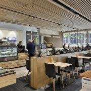 A café enlivens the lift and circulation lobby cafeteria, interior design, restaurant, gray