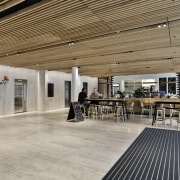 A timber batten ceiling above and matching area architecture, ceiling, floor, flooring, interior design, lobby, gray, brown