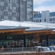 The saw-tooth roof on The Manakau Bus Interchange architecture, building, metropolitan area, black, gray