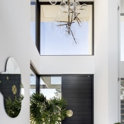 The dramatic double-height entry to the home. A 