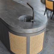 Wicker also surfaces on the kitchen island and 