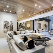 Living room with sculptural coffee table and showing 