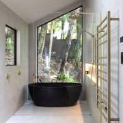 A floor-to-ceiling window at the rear of the 