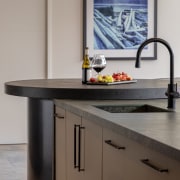 A contemporary mixer sets off the island benchtop 