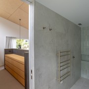 Shower, dividing door and storage bedhead. - Light-filled 