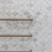 Bronze towel rails stand out against the shell 