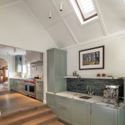 A window in the gabled ceiling brings natural 