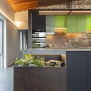 The kitchen includes a corner herb garden complete 