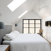 An airy new bedroom complete with skylights. 