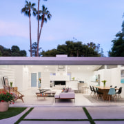 The living room opens up to the pool 