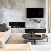 A Calder Coffee Table features in the living 