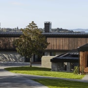 Above the brick ‘base’ walls are rich timber 