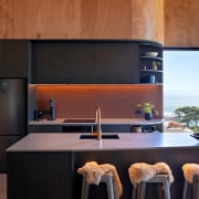 The black birch plywood joinery is paired with 