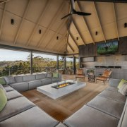 The outdoor entertaining kitchen is seamlessly integrated with 