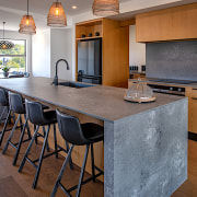 The look of wood meets the look of architecture, bar stool, building, cabinetry, countertop, design, dining room, floor, flooring, furniture, granite, hardwood, home, house, interior design, kitchen, property, real estate, room, stool, table, wood, wood flooring, wood stain, gray, brown