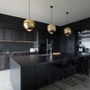 ​​​​​​​Given the 3m-format-sheeting, the Florim Stone on this countertop, interior design, kitchen, black, gray.Florim Stone, Archant