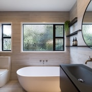 The owner wanted something different and to incorporate architecture, bathroom, estate, home, interior design, room, window, gray