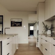 Looking through the kitchen towards the front entrance. 