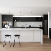 Black and white kitchen at the rear of 