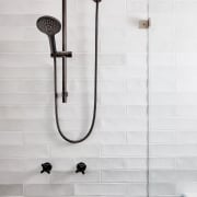 The contrast of glazed white tiles and black 