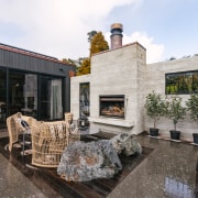 Pool area courtyard with built-in outdoor fireplace. 
