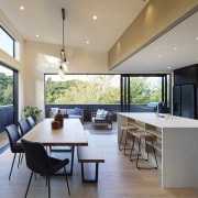 A living edge dining table is adjacent to 