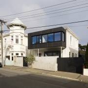 Street view of the expanded home. - Respectful 