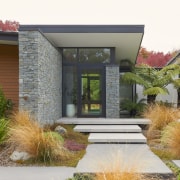 Front door approach – material selections are deliberately 