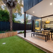 The rear of the home with generous backyard, 