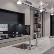 A mirror splashback adds to the sense of 