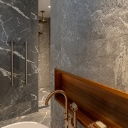 Tub and shower zone beyond. - Walnut and 