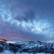 This all-weather mountain retreat is designed for recharging afterglow, atmosphere, cloud, dawn, dusk, evening, fell, freezing, geological phenomenon, horizon, landscape, meteorological phenomenon, morning, mount scenery, mountain, mountain range, sky, snow, sunlight, sunrise, sunset, tree, winter, blue, teal