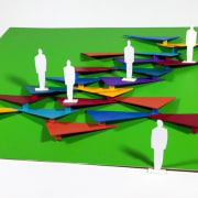 "Ici et ailleurs" or "Here and elsewhere": A construction paper, paper, table, white, green