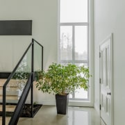 Neogothic architecture with contemporary character arch, architecture, building, ceiling, daylighting, floor, flooring, furniture, hall, handrail, hardwood, home, house, interior design, material property, property, real estate, room, stairs, window, gray