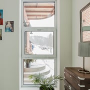 Neogothic architecture with contemporary character building, curtain, daylighting, desk, door, floor, furniture, green, home, house, interior design, property, room, shade, shelf, table, textile, turquoise, wall, window, window covering, window treatment, wood, gray