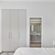 The bathroom in this master suite by EJ 