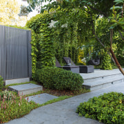 Entry to the garden, with pergola to right. 