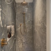 Fully tiled shower stall. - Wallnut and stone 