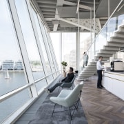 The harbour-facing facade of the developer's offices resembles architecture, building, daylighting, design, interior design, metropolitan area, white, gray