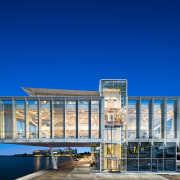 Exterior view of Amvest headquarters. At the heart architecture, blue, building, city, commercial building, corporate headquarters, facade, headquarters, home, house, mixed-use, real estate, sky, urban design, blue