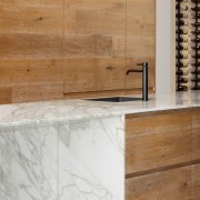 The custom solid timber joinery introduces warmth and 